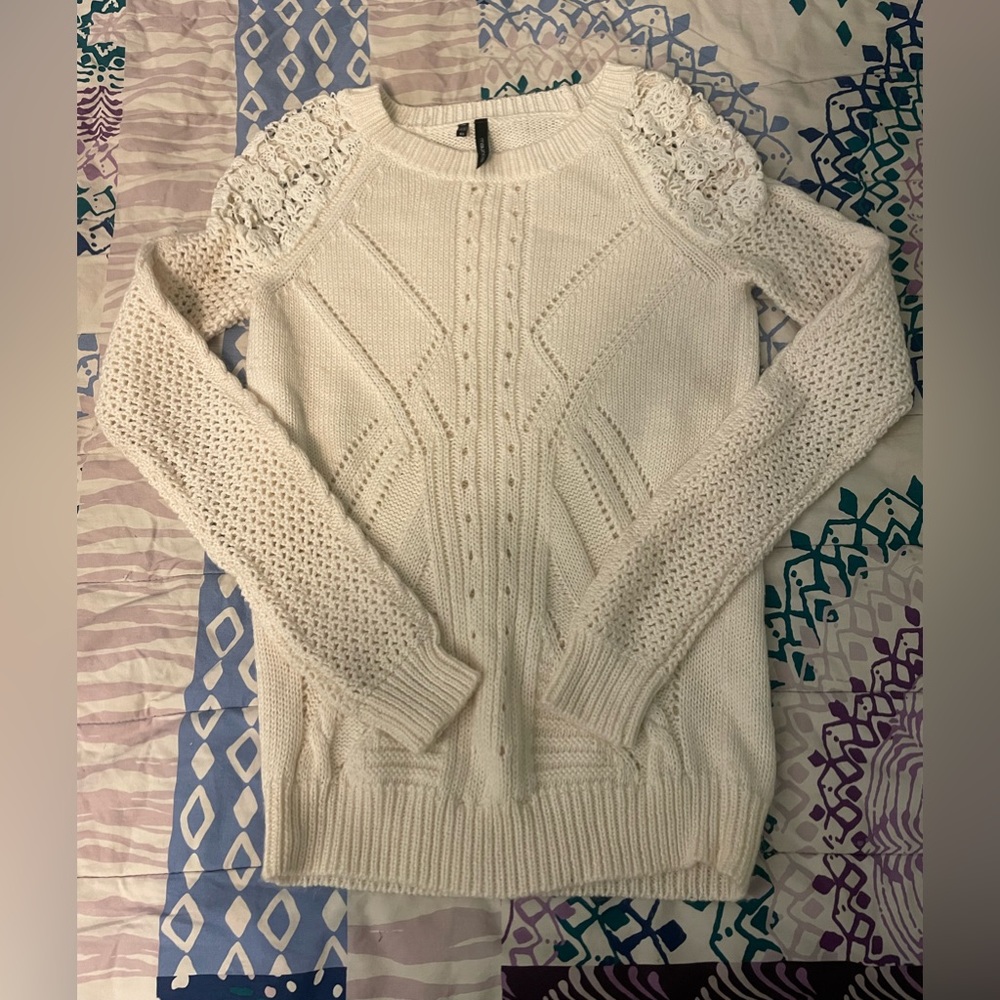 Maurice’s white sweater